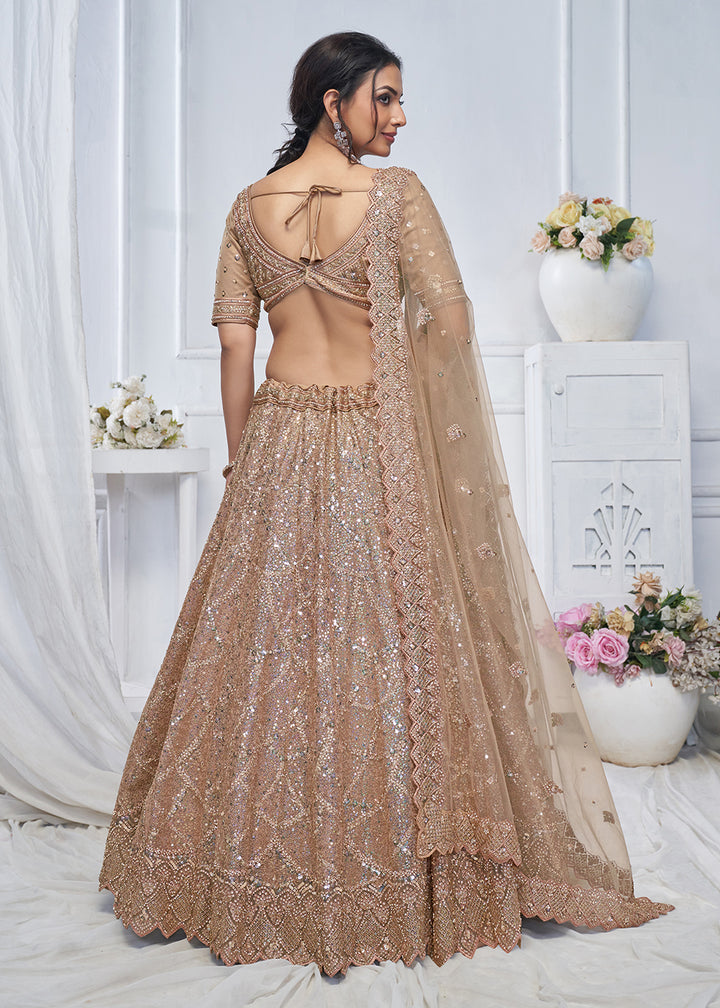 Buy Now Alluring Brown Heavy Embroidered Bridesmaids Lehenga Choli Online in USA, UK, France, UAE & Worldwide at Empress Clothing. 