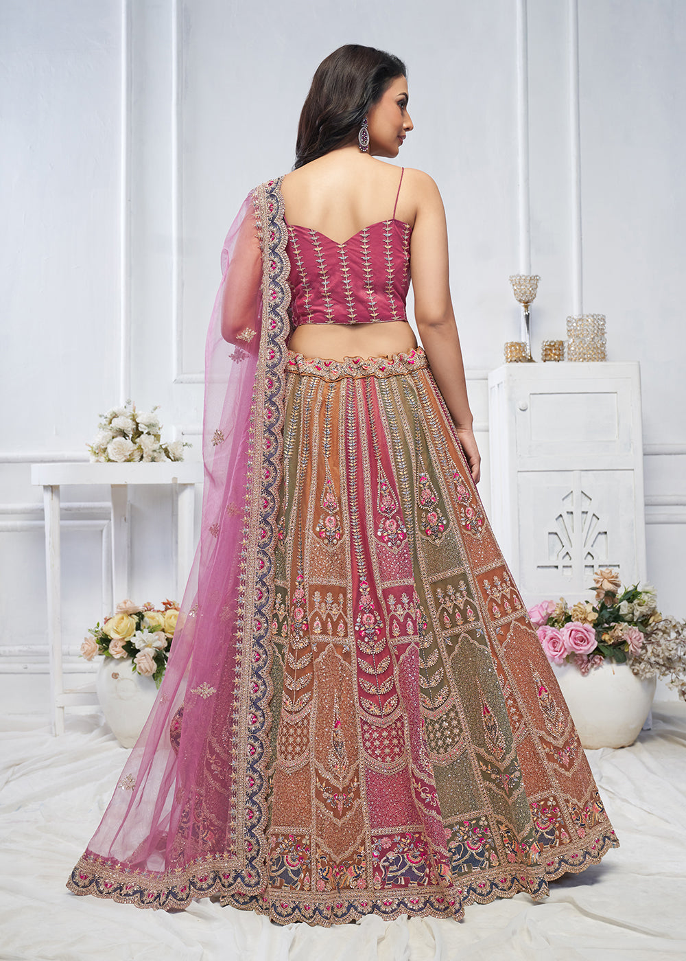 Buy Now Multi & Onion Pink Embroidered Wedding Wear Lehenga Choli Online in USA, UK, France, UAE & Worldwide at Empress Clothing. 