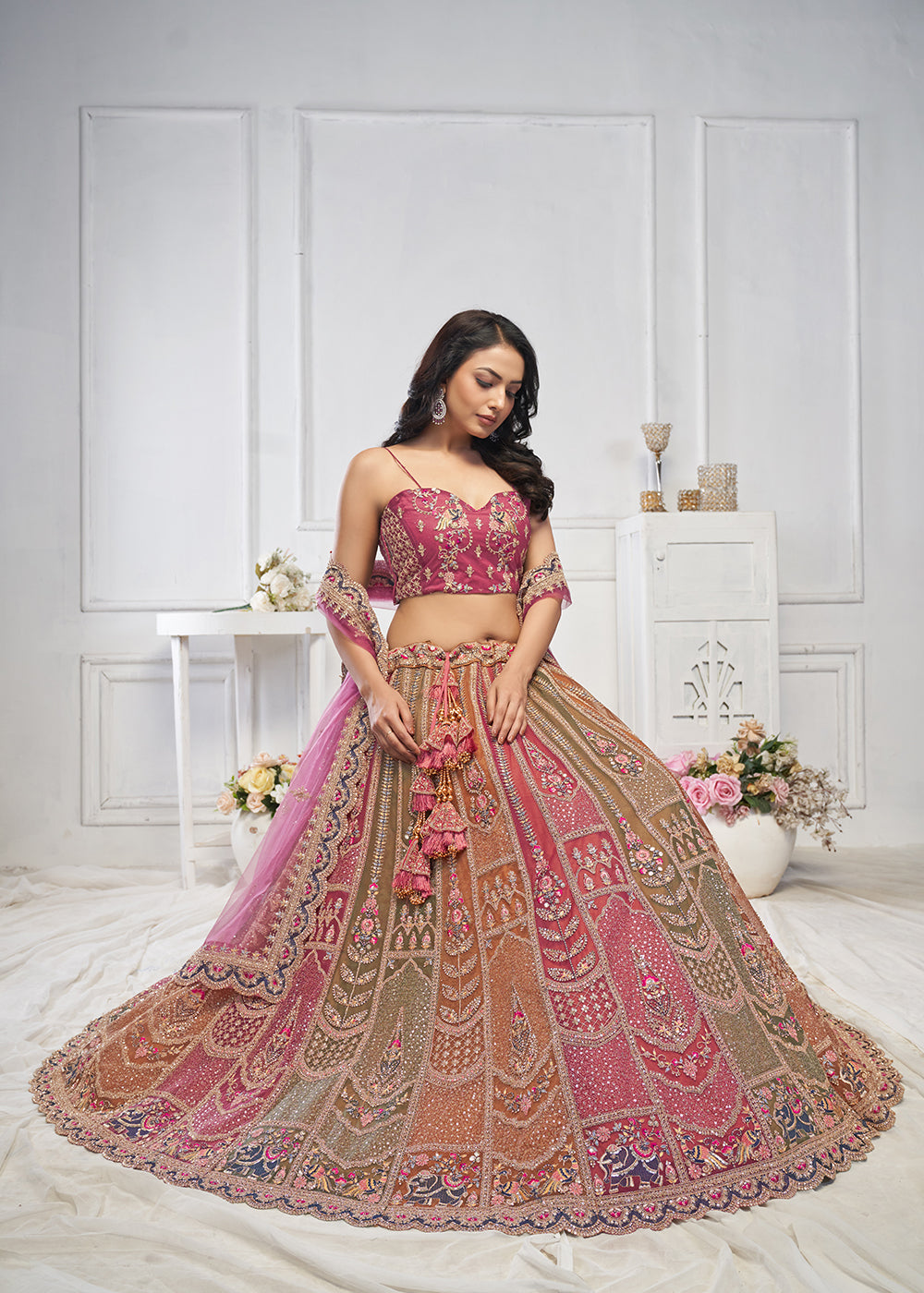 Buy Now Multi & Onion Pink Embroidered Wedding Wear Lehenga Choli Online in USA, UK, France, UAE & Worldwide at Empress Clothing. 