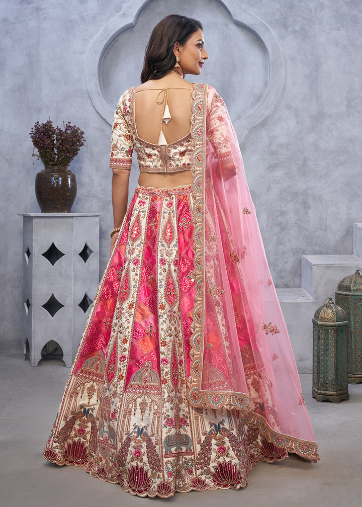 Buy Now Ivory Pink Organza Silk Heavy Embroidered Wedding Lehenga Choli Online in USA, UK, France, UAE & Worldwide at Empress Clothing. 