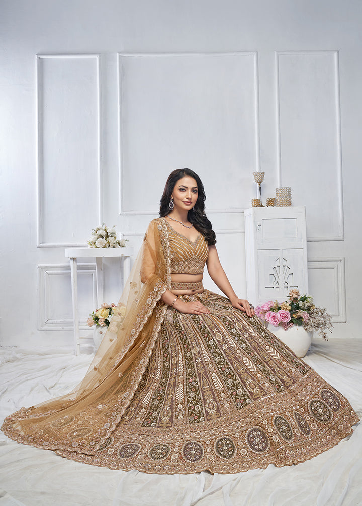 Buy Now Majestic Brown Heavy Embroidered Reception Lehenga Choli Online in USA, UK, France, & Worldwide at Empress Clothing. 