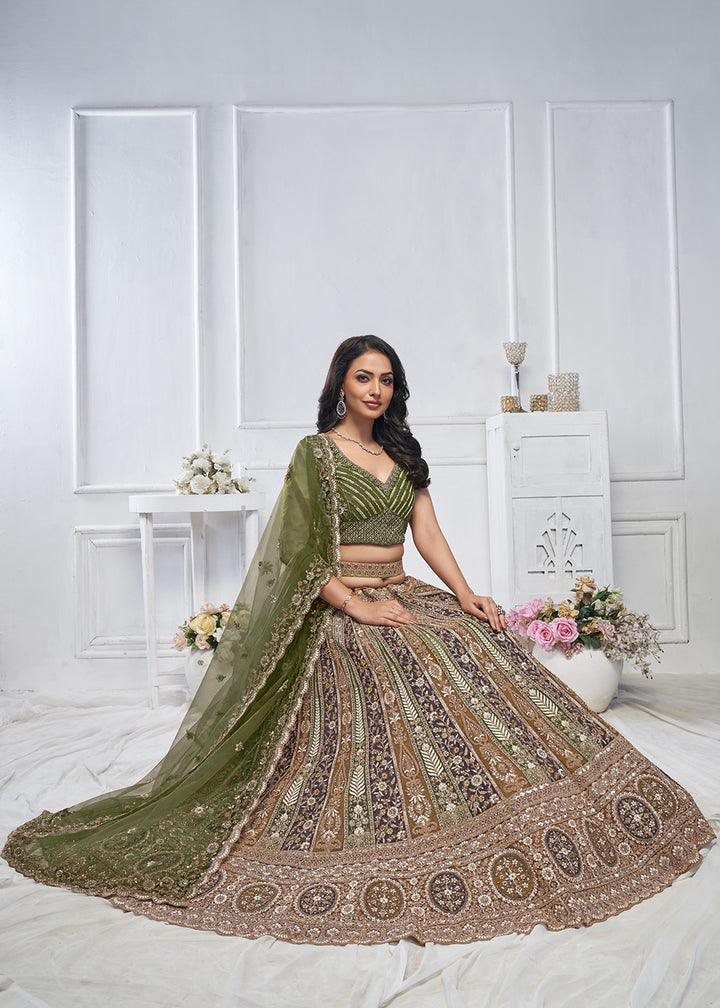 Buy Now Majestic Green Heavy Embroidered Reception Lehenga Choli Online in USA, UK, France, & Worldwide at Empress Clothing. 