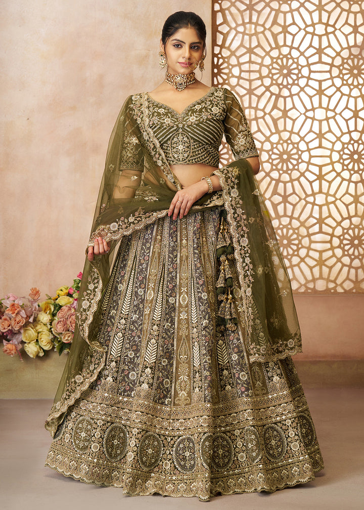 Buy Now Gorgeous Green Heavy Embroidered Bridal Lehenga for Mehndi Online in USA, UK, Canada, France, Italy, Germany, UAE & Worldwide at Empress Clothing.