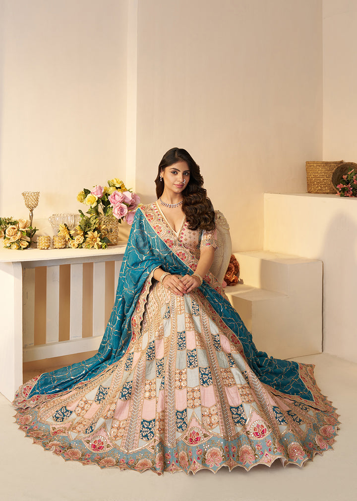Buy Now Sky Blue Dola Silk Sequin & Aari Work Wedding Lehenga Choli Online in USA, UK, Canada, France, Italy, Germany, Austria, UAE & Worldwide at Empress.