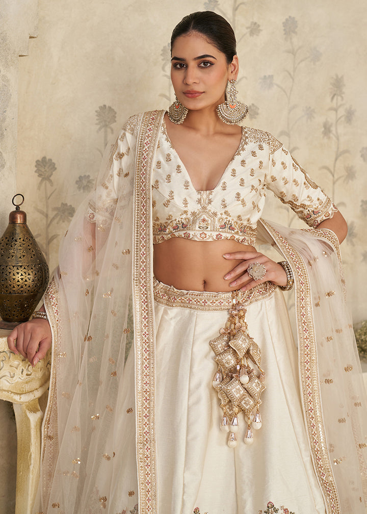 Buy Now Cream Elephant Zari Embroidered Bridal Lehenga Choli Online in US, UK, Canada, France, Italy, Germany, Sweden, Denmark, Greece & Worldwide at Empress.