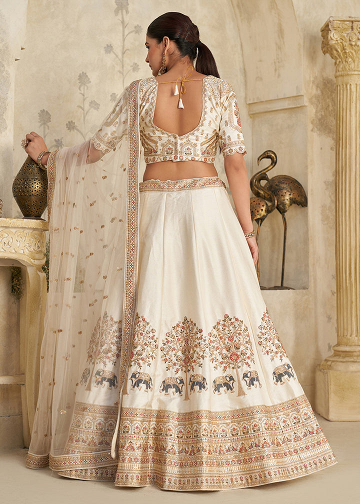 Buy Now Cream Elephant Zari Embroidered Bridal Lehenga Choli Online in US, UK, Canada, France, Italy, Germany, Sweden, Denmark, Greece & Worldwide at Empress.