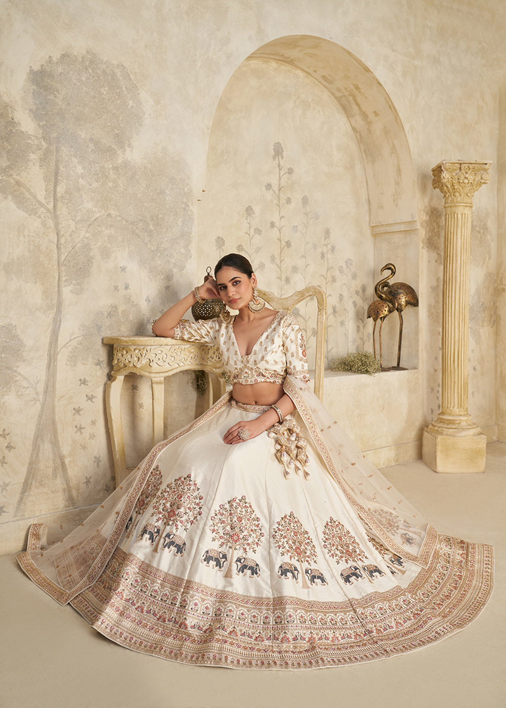 Buy Now Cream Elephant Zari Embroidered Bridal Lehenga Choli Online in US, UK, Canada, France, Italy, Germany, Sweden, Denmark, Greece & Worldwide at Empress.