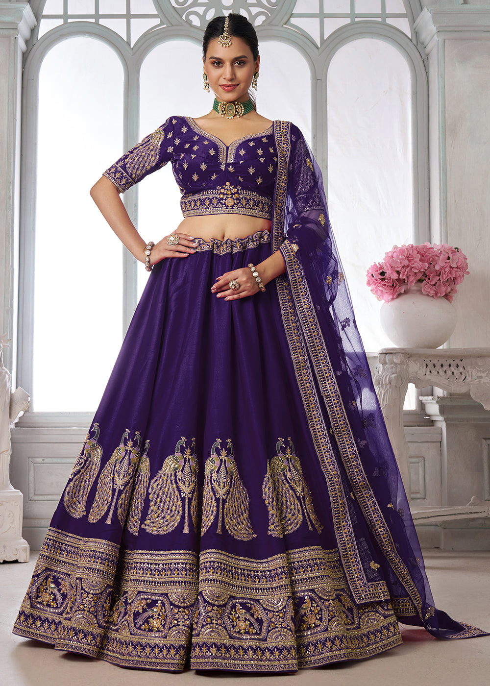 Buy Now Designer Purple Silk Lehenga Choli with Embroidered Peacock Motifs Online in US, UK, Canada, France, Italy, Greece, Sweden, UAE & Worldwide at Empress.
