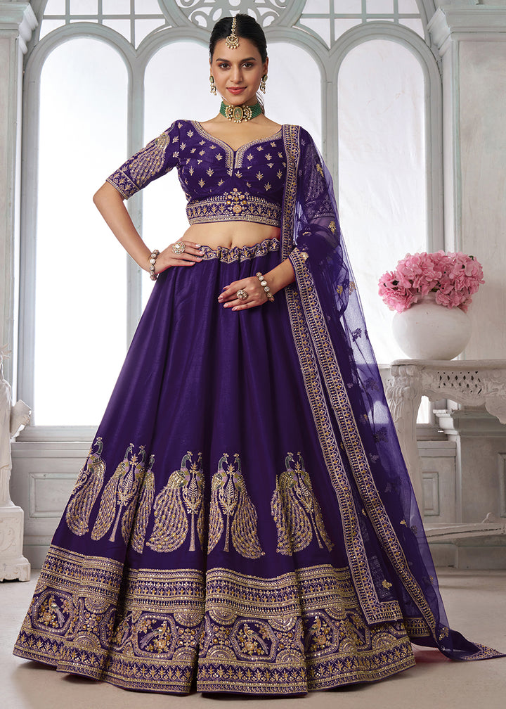 Buy Now Designer Purple Silk Lehenga Choli with Embroidered Peacock Motifs Online in US, UK, Canada, France, Italy, Greece, Sweden, UAE &amp; Worldwide at Empress.