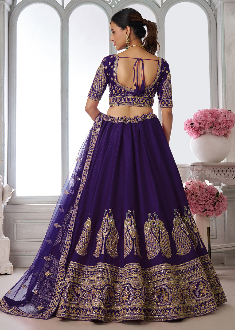 Buy Now Designer Purple Silk Lehenga Choli with Embroidered Peacock Motifs Online in US, UK, Canada, France, Italy, Greece, Sweden, UAE &amp; Worldwide at Empress.
