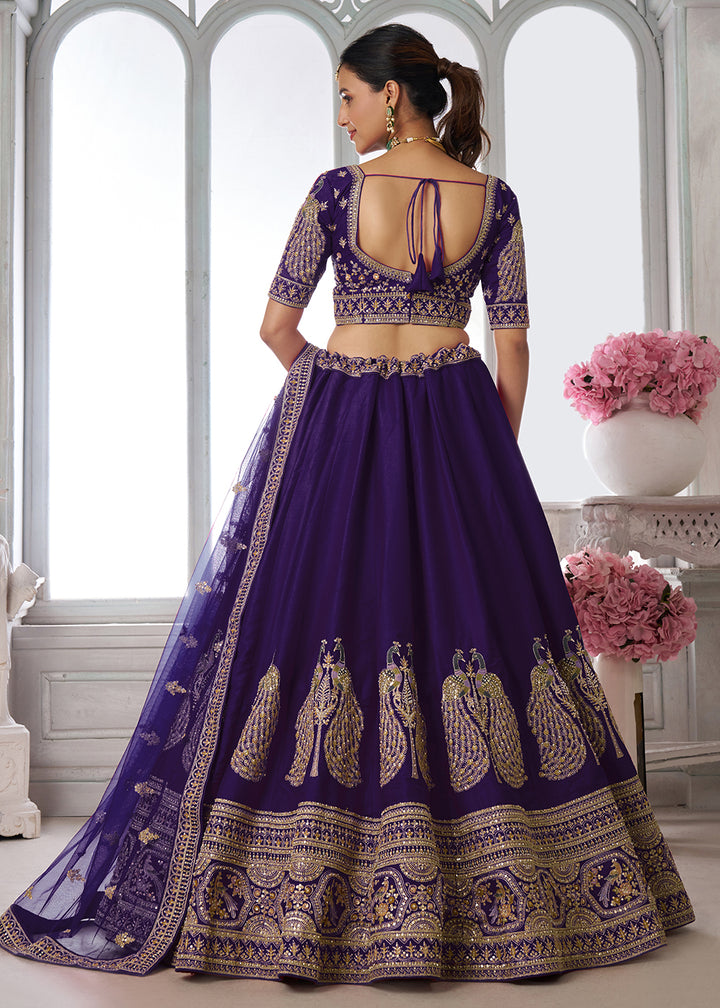 Buy Now Designer Purple Silk Lehenga Choli with Embroidered Peacock Motifs Online in US, UK, Canada, France, Italy, Greece, Sweden, UAE &amp; Worldwide at Empress.