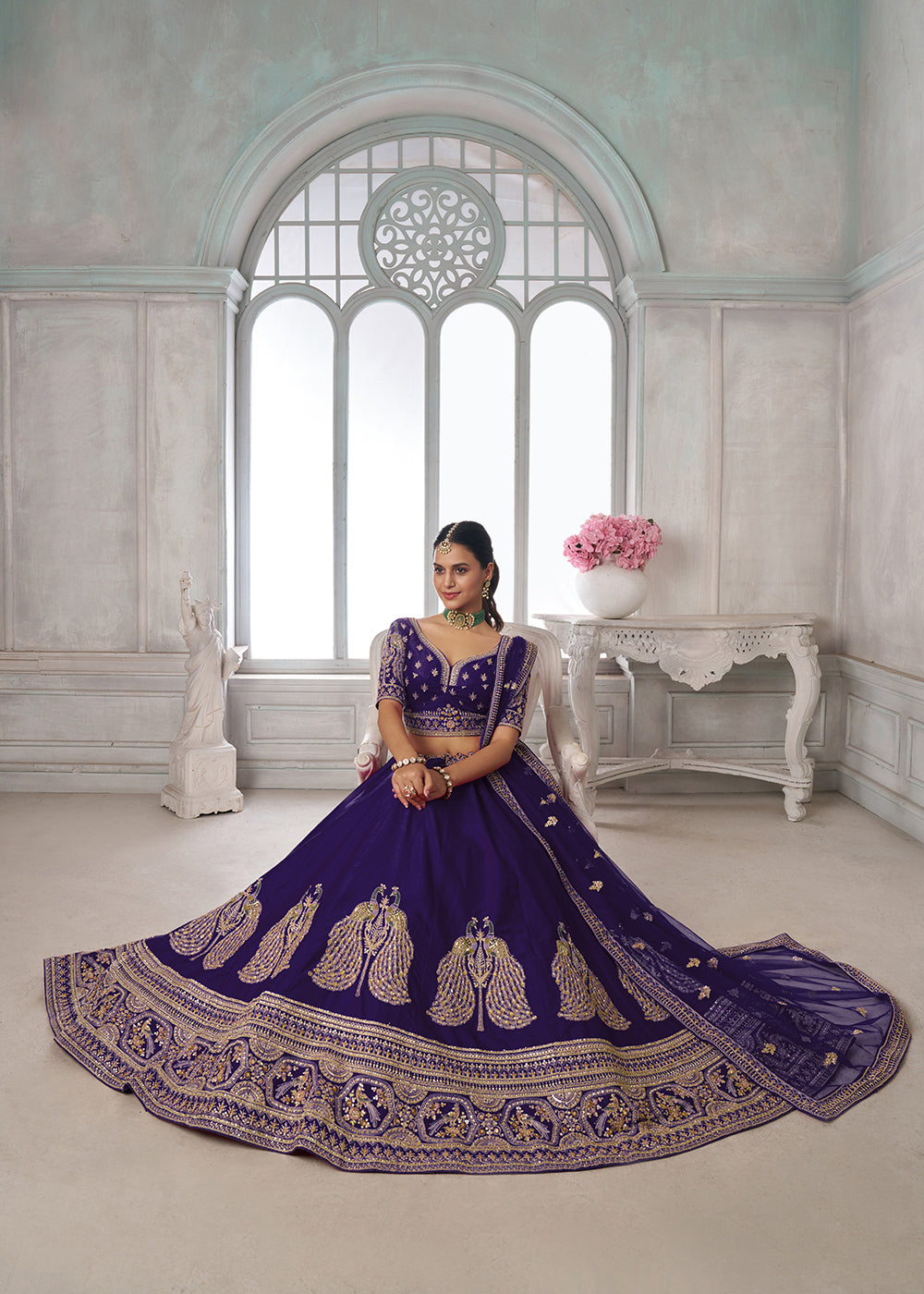 Buy Now Designer Purple Silk Lehenga Choli with Embroidered Peacock Motifs Online in US, UK, Canada, France, Italy, Greece, Sweden, UAE &amp; Worldwide at Empress.