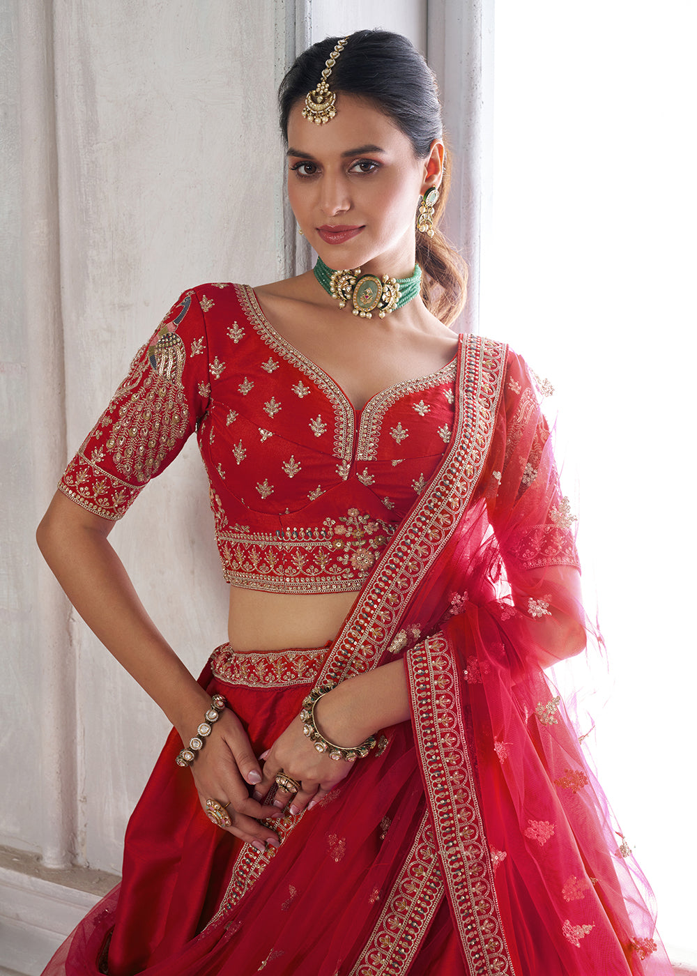 Buy Now Designer Red Silk Lehenga Choli with Embroidered Peacock Motifs Online in US, UK, Canada, France, Italy, Greece, Sweden, UAE &amp; Worldwide at Empress.