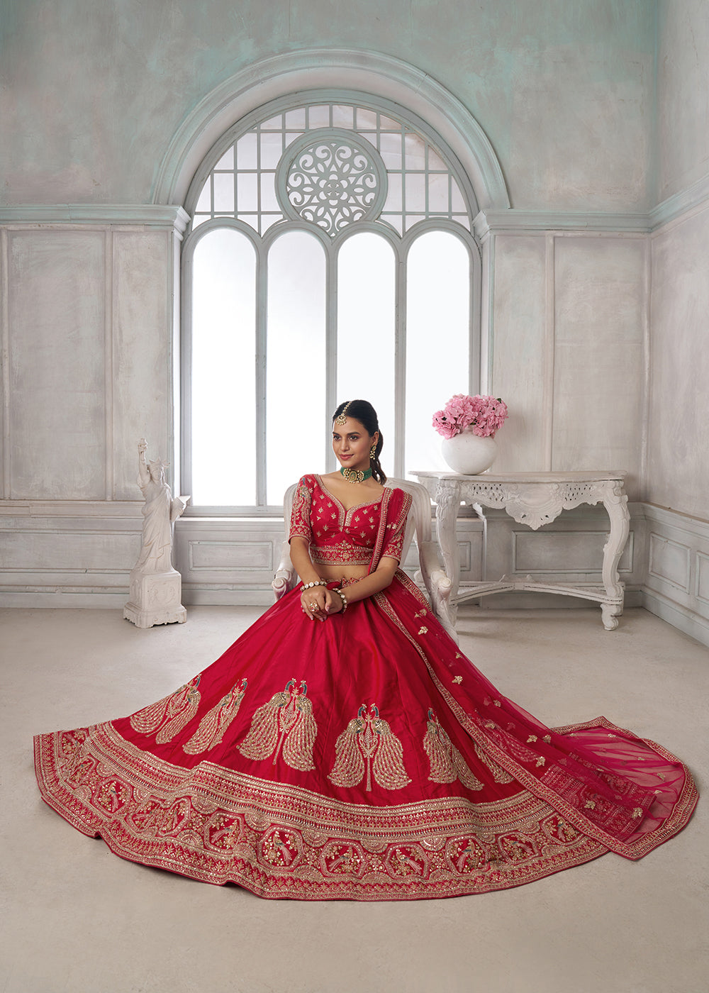 Buy Now Designer Red Silk Lehenga Choli with Embroidered Peacock Motifs Online in US, UK, Canada, France, Italy, Greece, Sweden, UAE &amp; Worldwide at Empress.
