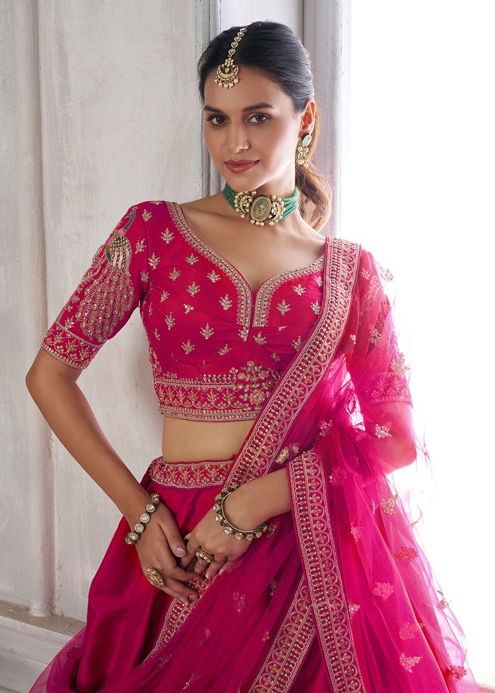 Buy Now Designer Pink Silk Lehenga Choli with Embroidered Peacock Motifs Online in US, UK, Canada, France, Italy, Greece, Sweden, UAE &amp; Worldwide at Empress.