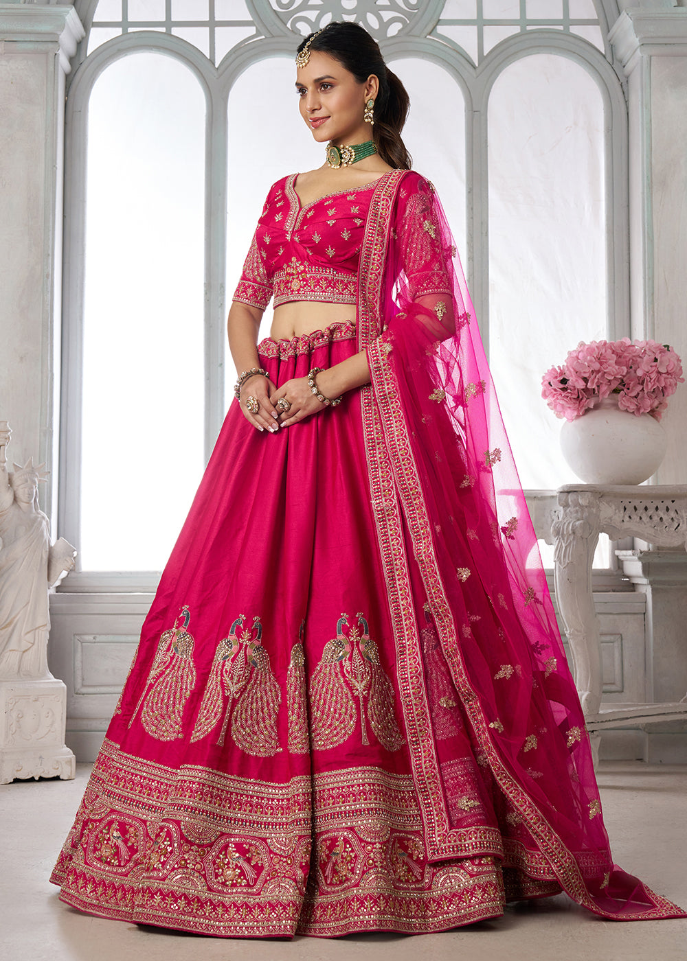 Buy Now Designer Pink Silk Lehenga Choli with Embroidered Peacock Motifs Online in US, UK, Canada, France, Italy, Greece, Sweden, UAE &amp; Worldwide at Empress.