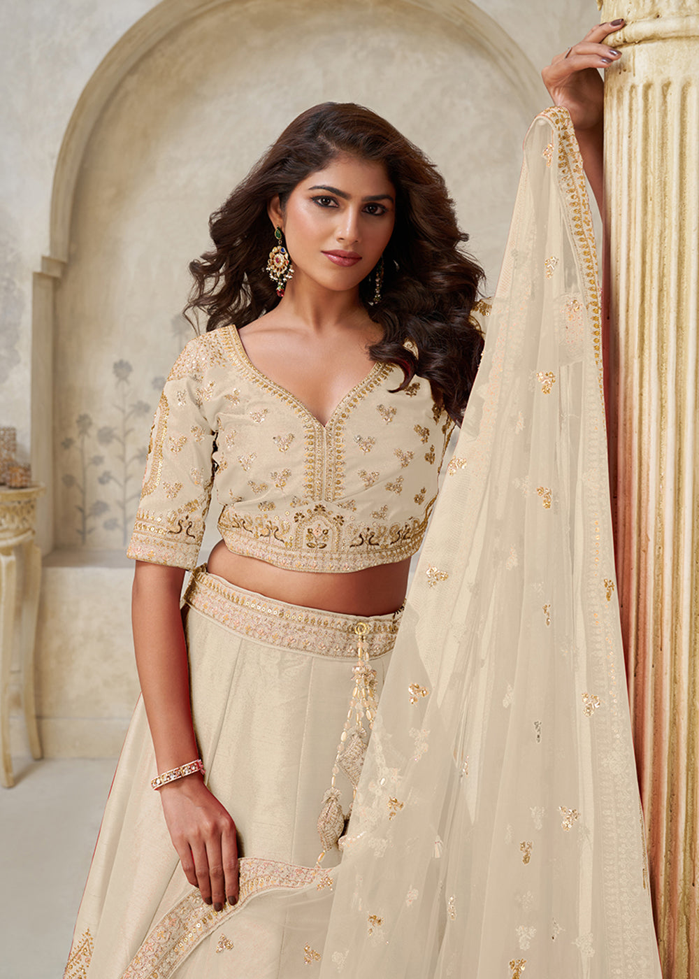 Buy Now Cream Leaf Motifs Embroidered Wedding Lehenga Choli Online in US, UK, Canada, France, Italy, Germany, Sweden, Denmark, Greece & Worldwide at Empress.