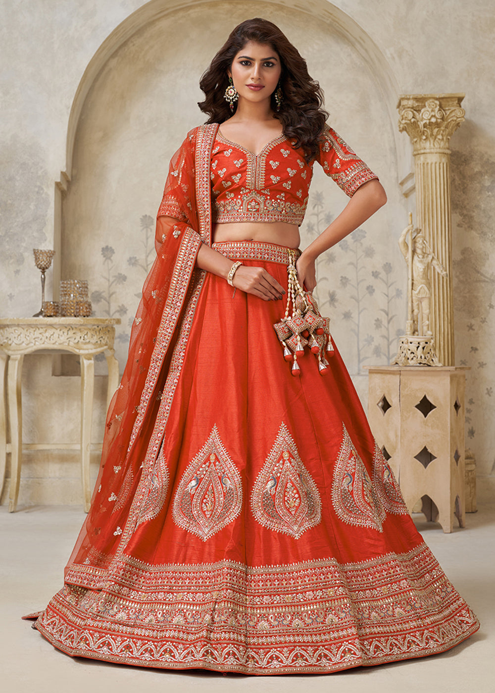 Buy Now Orange Leaf Motifs Embroidered Wedding Lehenga Choli Online in US, UK, Canada, France, Italy, Germany, Sweden, Denmark, Greece & Worldwide at Empress.