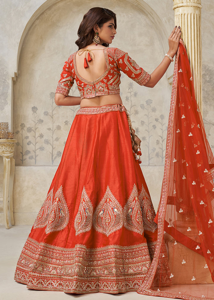 Buy Now Orange Leaf Motifs Embroidered Wedding Lehenga Choli Online in US, UK, Canada, France, Italy, Germany, Sweden, Denmark, Greece & Worldwide at Empress.