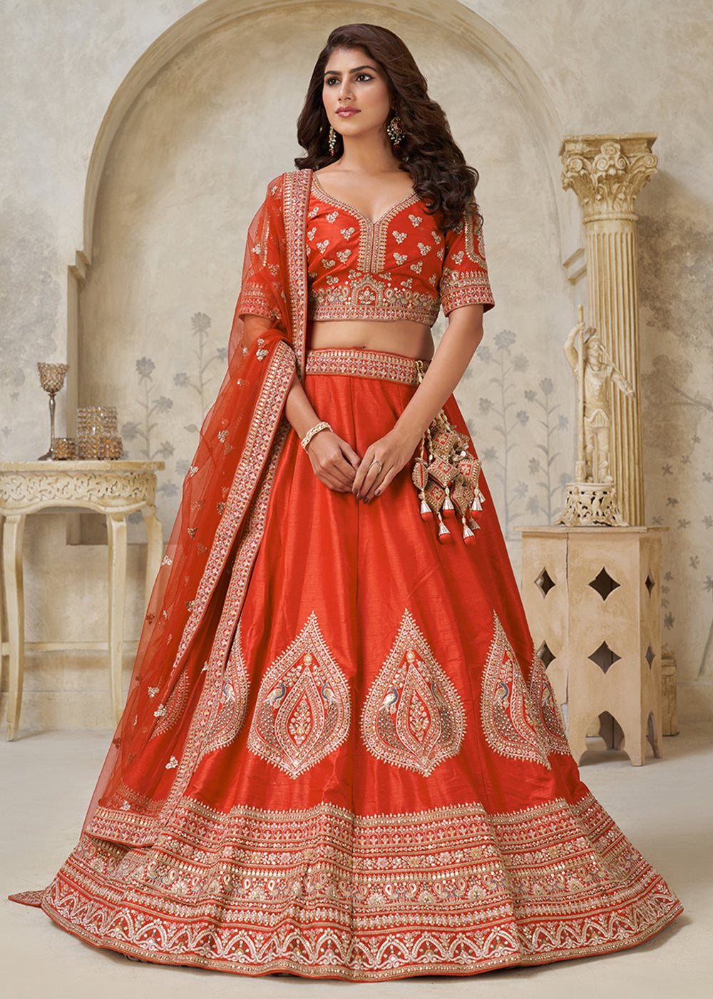 Buy Now Orange Leaf Motifs Embroidered Wedding Lehenga Choli Online in US, UK, Canada, France, Italy, Germany, Sweden, Denmark, Greece & Worldwide at Empress.