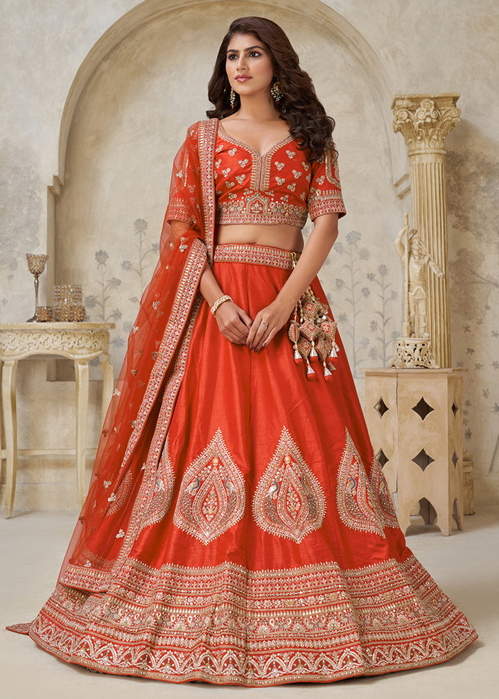 Buy Now Orange Leaf Motifs Embroidered Wedding Lehenga Choli Online in US, UK, Canada, France, Italy, Germany, Sweden, Denmark, Greece & Worldwide at Empress.