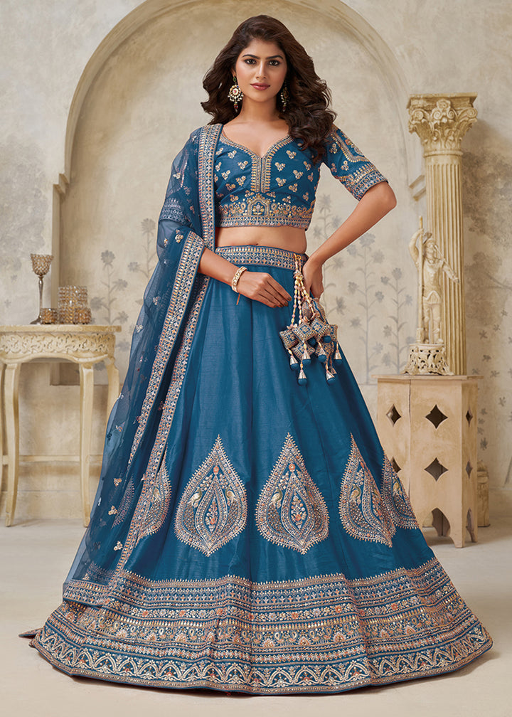 Buy Now Blue Leaf Motifs Embroidered Wedding Lehenga Choli Online in US, UK, Canada, France, Italy, Germany, Sweden, Denmark, Greece & Worldwide at Empress.