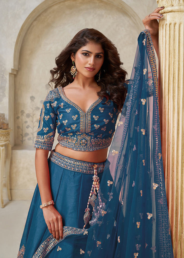 Buy Now Blue Leaf Motifs Embroidered Wedding Lehenga Choli Online in US, UK, Canada, France, Italy, Germany, Sweden, Denmark, Greece & Worldwide at Empress.