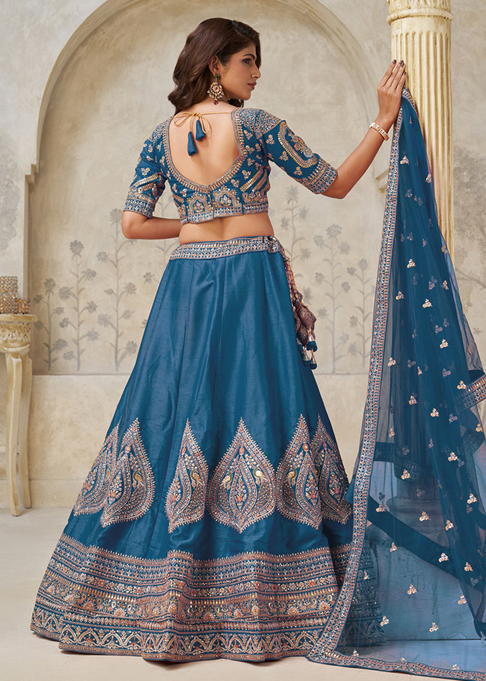 Buy Now Blue Leaf Motifs Embroidered Wedding Lehenga Choli Online in US, UK, Canada, France, Italy, Germany, Sweden, Denmark, Greece & Worldwide at Empress.
