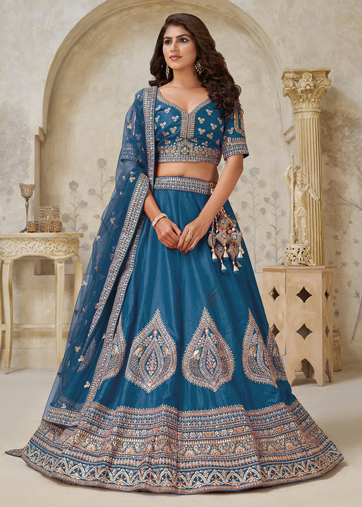 Buy Now Blue Leaf Motifs Embroidered Wedding Lehenga Choli Online in US, UK, Canada, France, Italy, Germany, Sweden, Denmark, Greece & Worldwide at Empress.