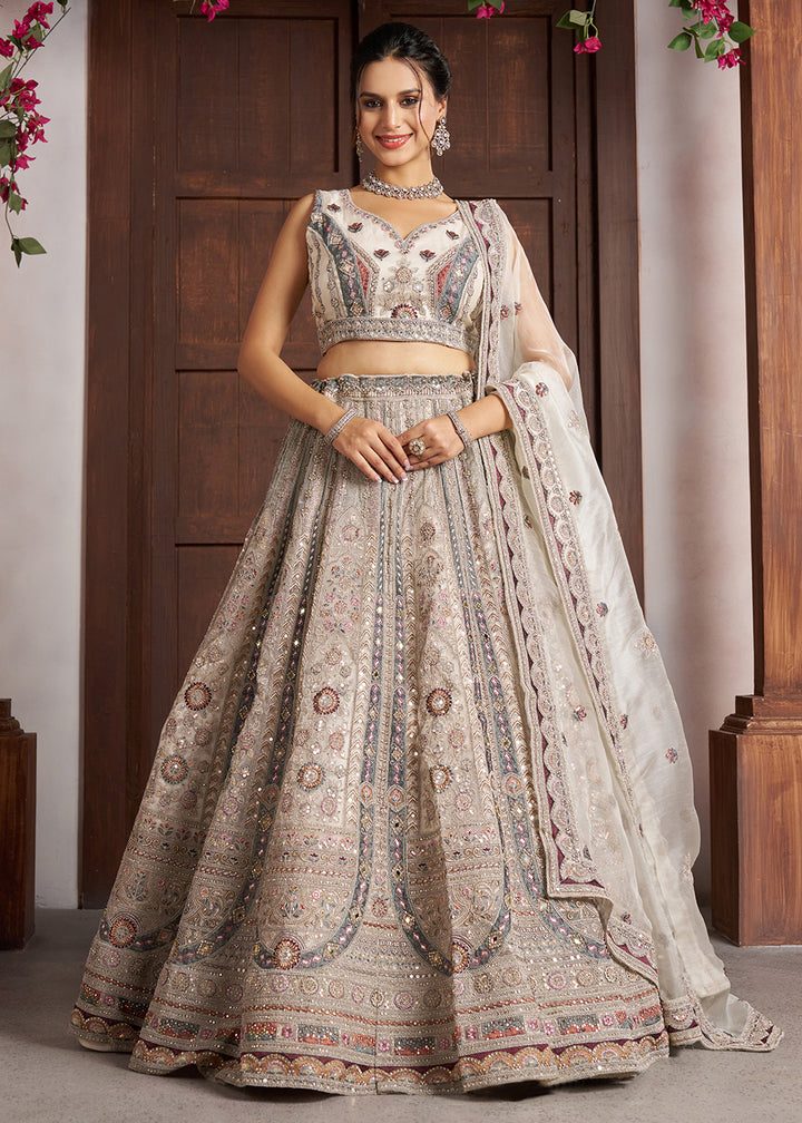 Buy Now Premium White Bridal Lehenga with Intricate Floral Artistry Online in US, UK, Canada, France, Italy, Greece, Sweden, Denmark, UAE&amp; Worldwide at Empress.
