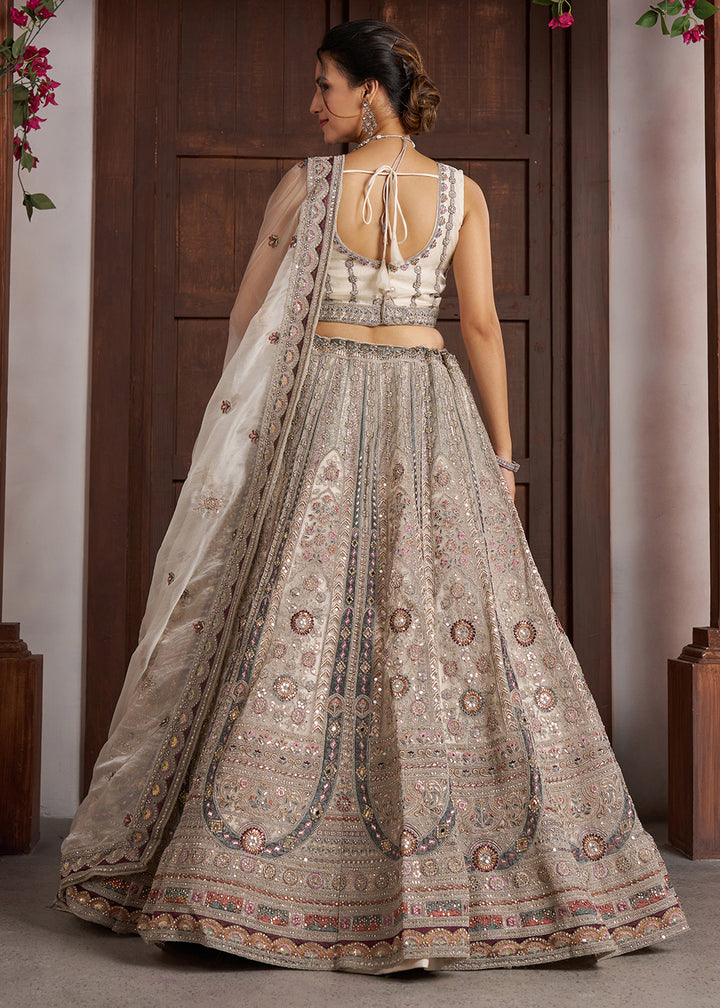 Buy Now Premium White Bridal Lehenga with Intricate Floral Artistry Online in US, UK, Canada, France, Italy, Greece, Sweden, Denmark, UAE&amp; Worldwide at Empress.