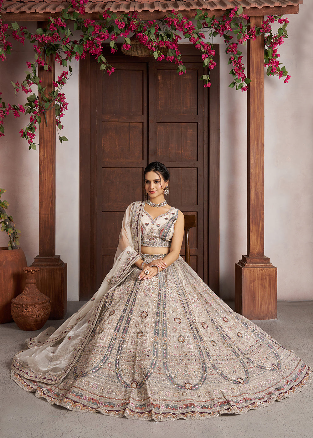 Buy Now Premium White Bridal Lehenga with Intricate Floral Artistry Online in US, UK, Canada, France, Italy, Greece, Sweden, Denmark, UAE&amp; Worldwide at Empress.