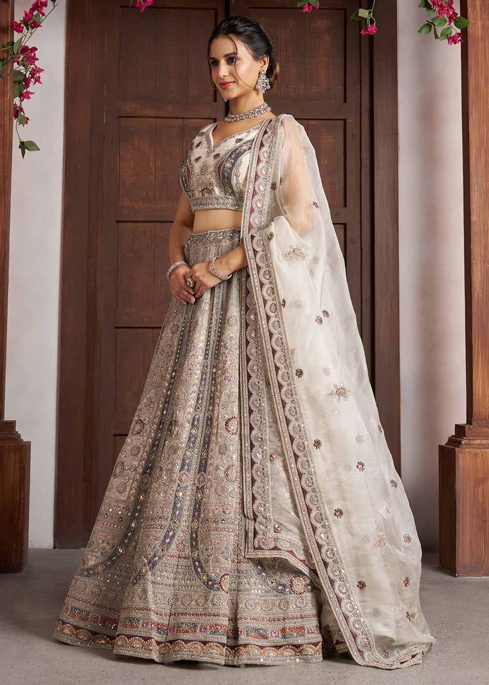 Buy Now Premium White Bridal Lehenga with Intricate Floral Artistry Online in US, UK, Canada, France, Italy, Greece, Sweden, Denmark, UAE&amp; Worldwide at Empress.