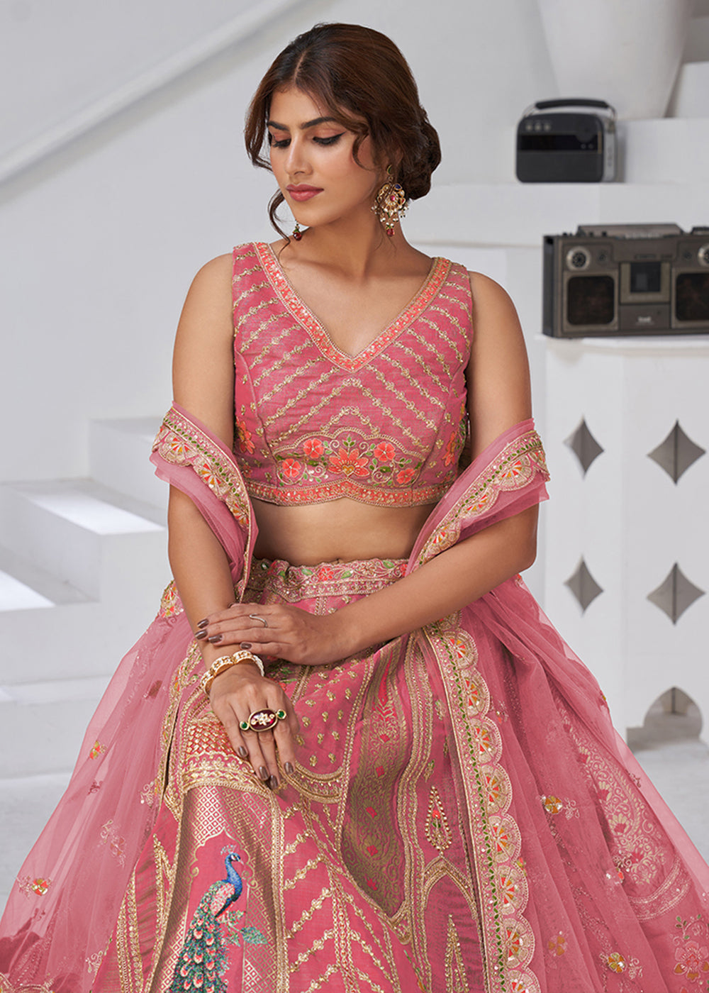 Buy Now Pink Peacock Feather Motifs Traditional Lehenga Choli Online in US, UK, Canada, France, Italy, Germany, Sweden, Denmark, Greece & Worldwide at Empress.