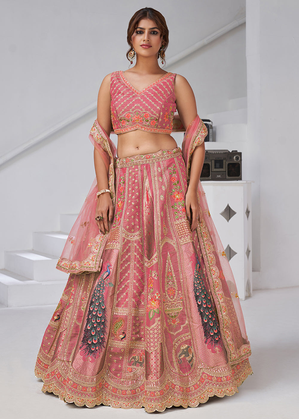 Buy Now Pink Peacock Feather Motifs Traditional Lehenga Choli Online in US, UK, Canada, France, Italy, Germany, Sweden, Denmark, Greece & Worldwide at Empress.