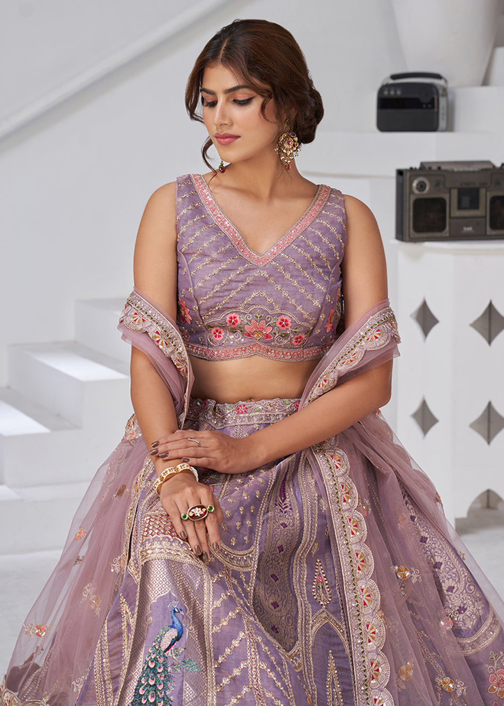 Buy Now Purple Peacock Feather Motifs Traditional Lehenga Choli Online in US, UK, Canada, France, Italy, Germany, Sweden, Denmark, Greece & Worldwide at Empress.