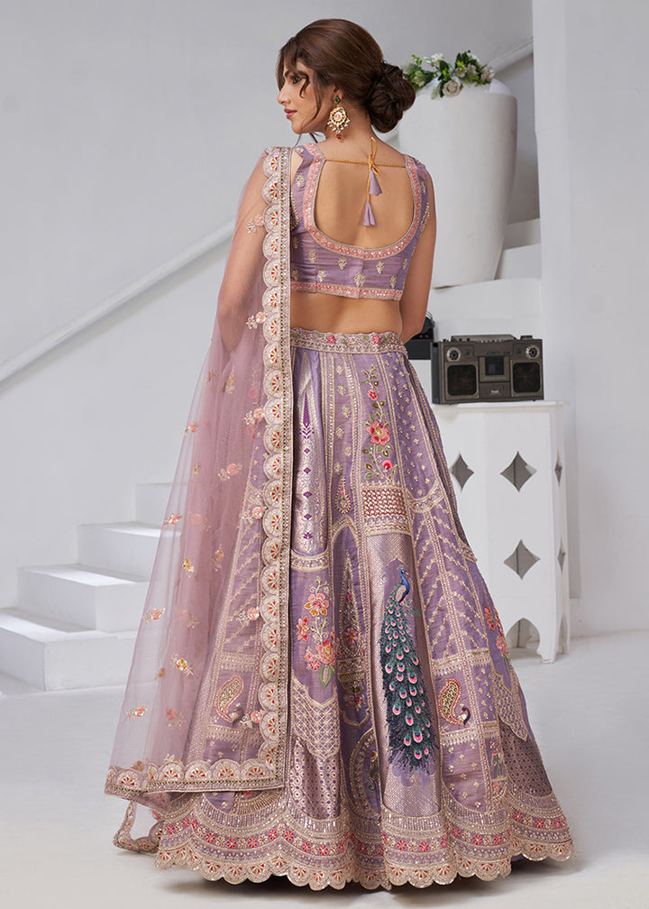 Buy Now Purple Peacock Feather Motifs Traditional Lehenga Choli Online in US, UK, Canada, France, Italy, Germany, Sweden, Denmark, Greece & Worldwide at Empress.