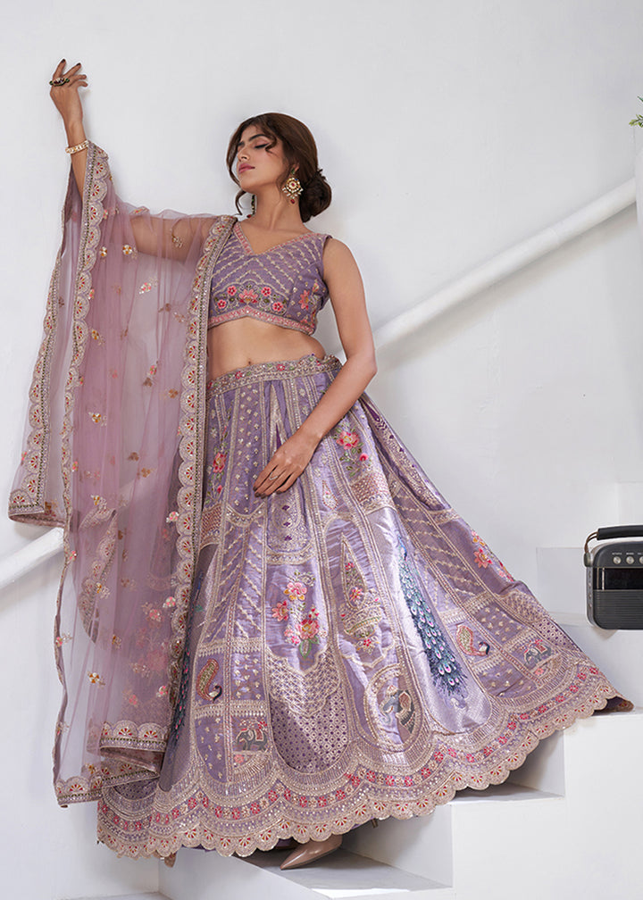 Buy Now Purple Peacock Feather Motifs Traditional Lehenga Choli Online in US, UK, Canada, France, Italy, Germany, Sweden, Denmark, Greece & Worldwide at Empress.