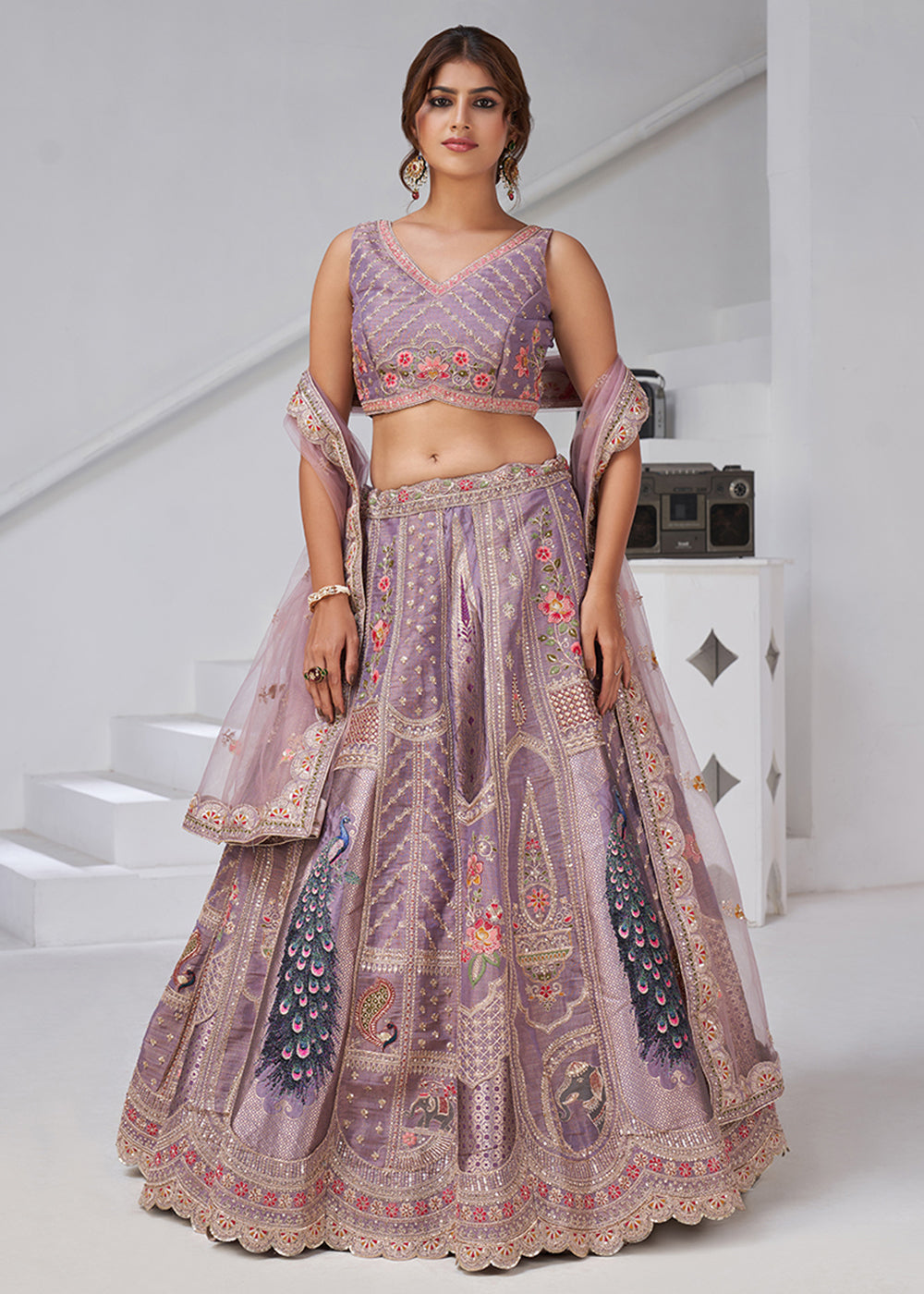 Buy Now Purple Peacock Feather Motifs Traditional Lehenga Choli Online in US, UK, Canada, France, Italy, Germany, Sweden, Denmark, Greece & Worldwide at Empress.