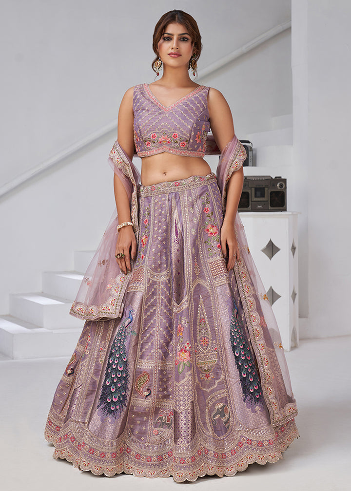 Buy Now Purple Peacock Feather Motifs Traditional Lehenga Choli Online in US, UK, Canada, France, Italy, Germany, Sweden, Denmark, Greece & Worldwide at Empress.