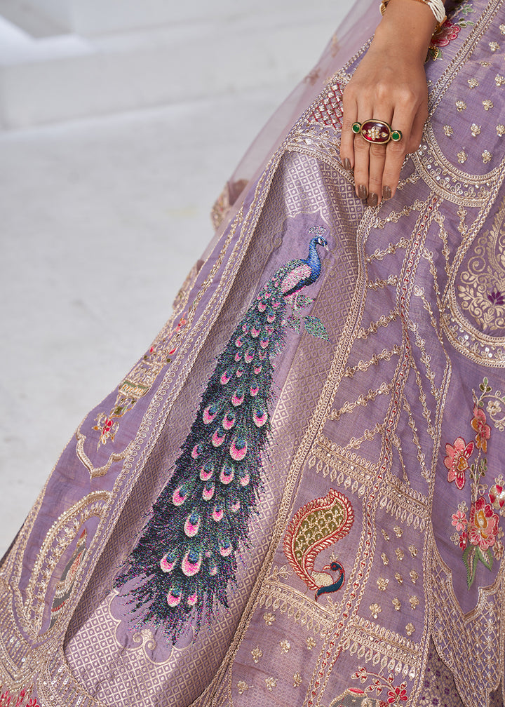 Buy Now Purple Peacock Feather Motifs Traditional Lehenga Choli Online in US, UK, Canada, France, Italy, Germany, Sweden, Denmark, Greece & Worldwide at Empress.