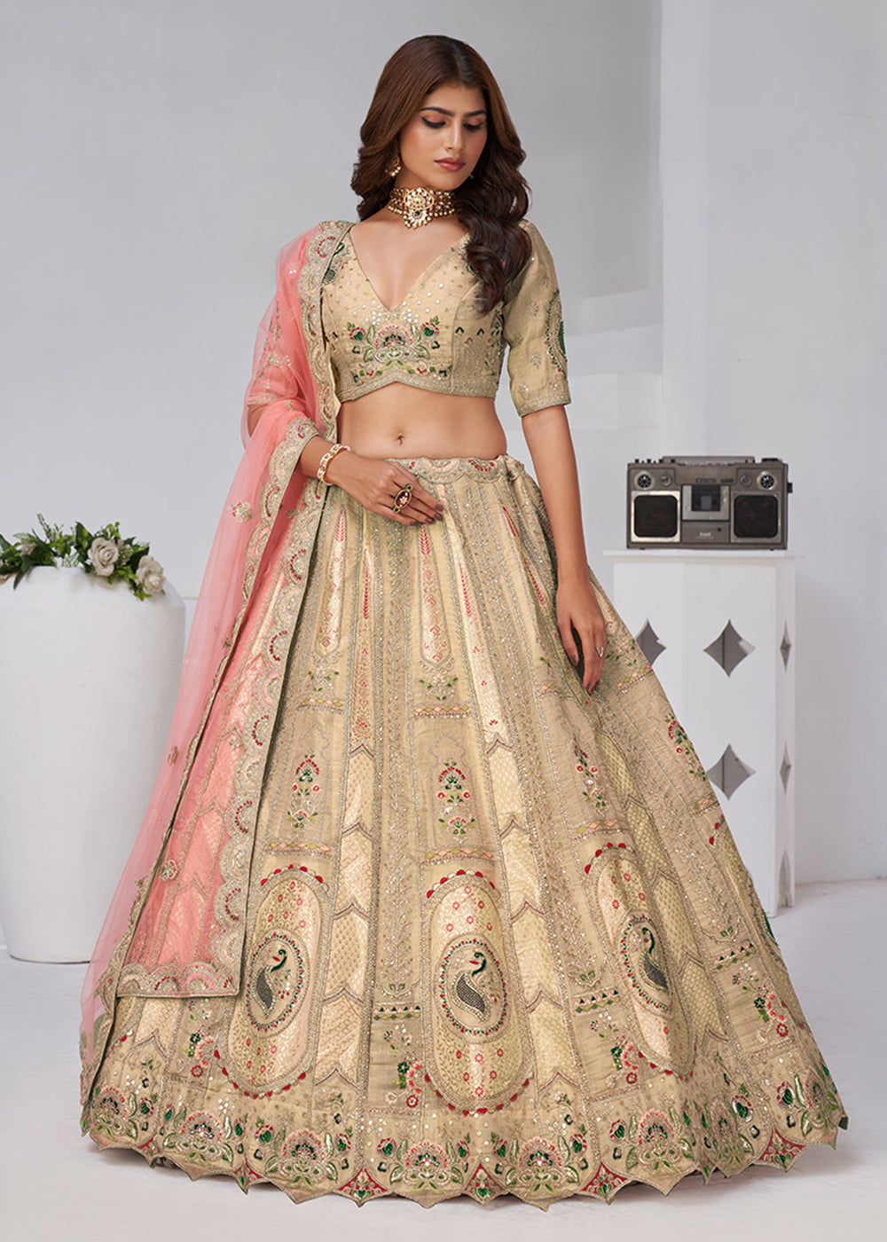 Buy Now Beige Peacock Paisley Motifs Traditional Lehenga Choli Online in US, UK, Canada, France, Italy, Germany, Sweden, Denmark, Greece & Worldwide at Empress.