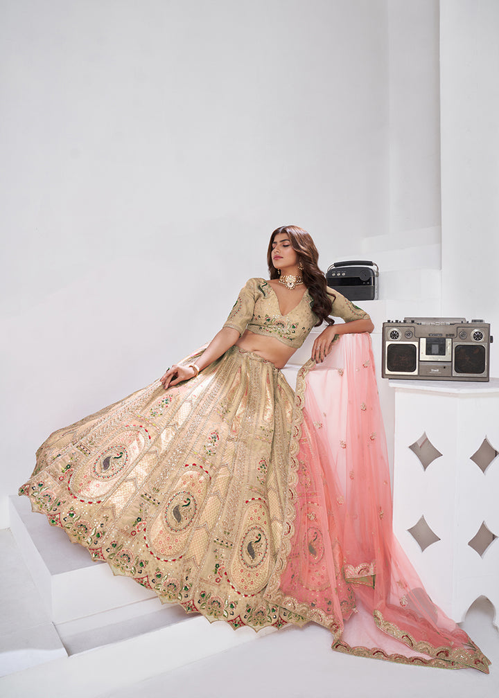 Buy Now Beige Peacock Paisley Motifs Traditional Lehenga Choli Online in US, UK, Canada, France, Italy, Germany, Sweden, Denmark, Greece & Worldwide at Empress.