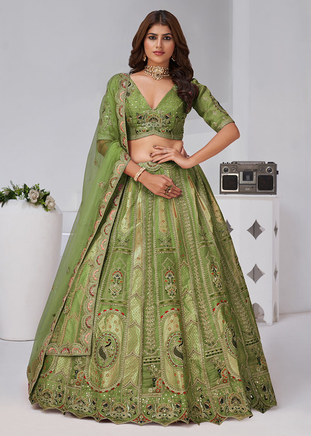 Buy Now Green Peacock Paisley Motifs Traditional Lehenga Choli Online in US, UK, Canada, France, Italy, Germany, Sweden, Denmark, Greece & Worldwide at Empress.