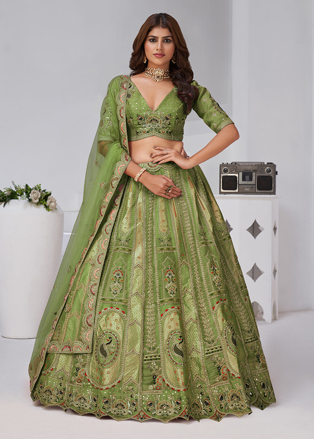 Buy Now Green Peacock Paisley Motifs Traditional Lehenga Choli Online in US, UK, Canada, France, Italy, Germany, Sweden, Denmark, Greece & Worldwide at Empress.
