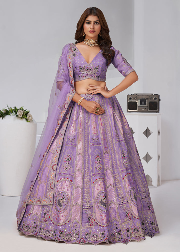 Buy Now Purple Peacock Paisley Motifs Traditional Lehenga Choli Online in US, UK, Canada, France, Italy, Germany, Sweden, Denmark, Greece & Worldwide at Empress.