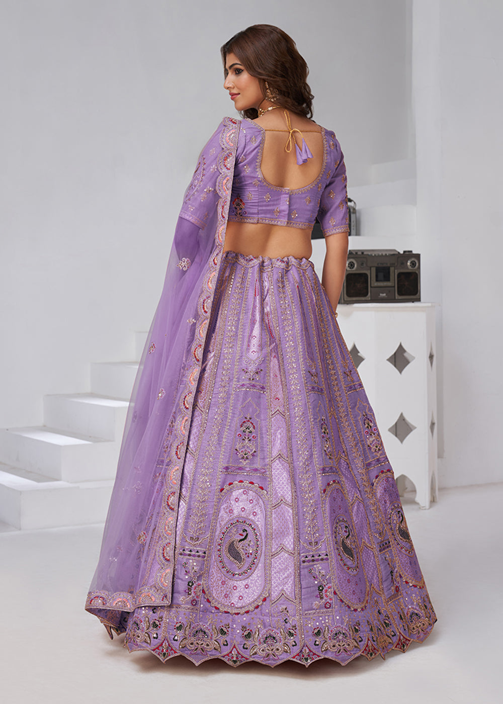 Buy Now Purple Peacock Paisley Motifs Traditional Lehenga Choli Online in US, UK, Canada, France, Italy, Germany, Sweden, Denmark, Greece & Worldwide at Empress.