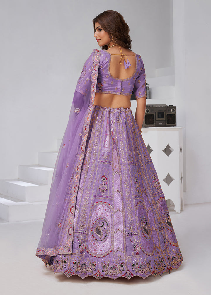 Buy Now Purple Peacock Paisley Motifs Traditional Lehenga Choli Online in US, UK, Canada, France, Italy, Germany, Sweden, Denmark, Greece & Worldwide at Empress.