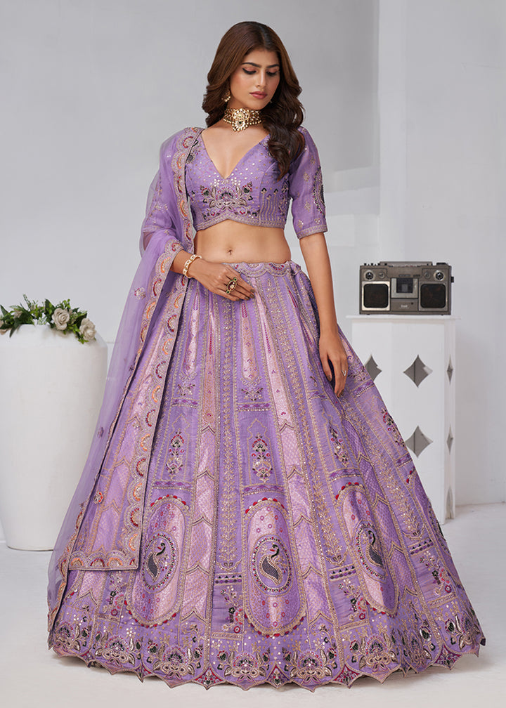 Buy Now Purple Peacock Paisley Motifs Traditional Lehenga Choli Online in US, UK, Canada, France, Italy, Germany, Sweden, Denmark, Greece & Worldwide at Empress.