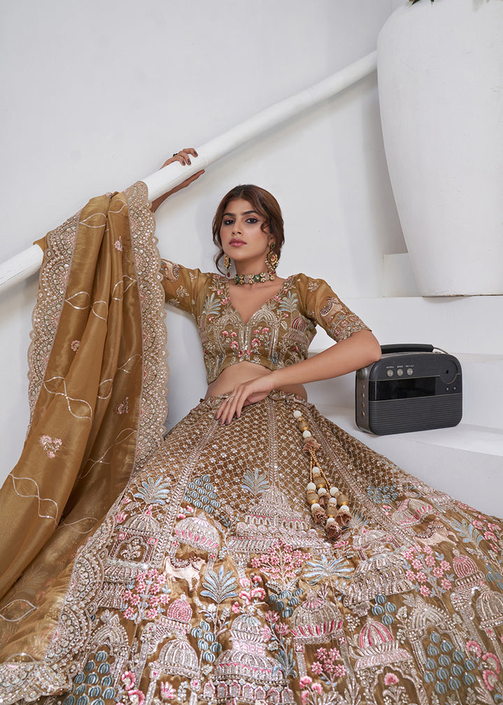 Buy Now Green Temple & Cow Motifs Bridal Lehenga Choli Online in US, UK, Canada, France, Italy, Germany, Sweden, Denmark, Greece, Ireland & Worldwide at Empress